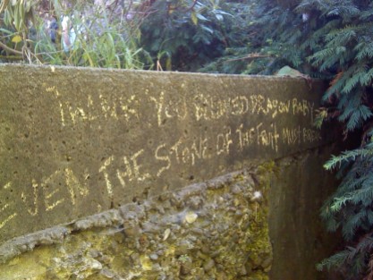 An interesting bit of graffiti along the bank of the river: "Thank you Beloved Dragon Baby/Even the stone of the fruit must break"
